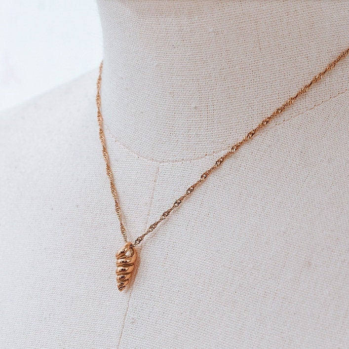 This beautiful seashell necklace is waterproof and tarnish free!